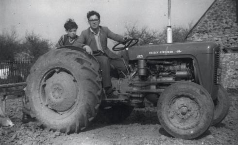 Lives 1 Les (and a nephew) with his first tractor, which he bought in 1960