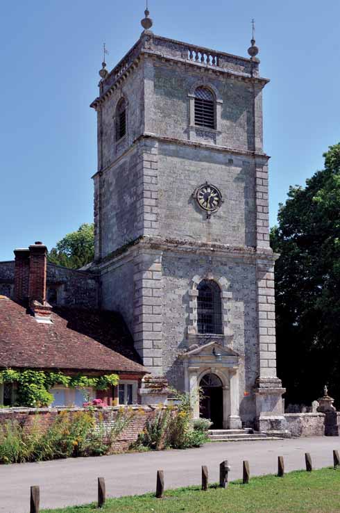 211edWimbStGiles1 The church tower dates to 1732 and was probably designed by the Bastard brothers of Blandford; it is attached to the earlier almshouses, which were built in 1624
