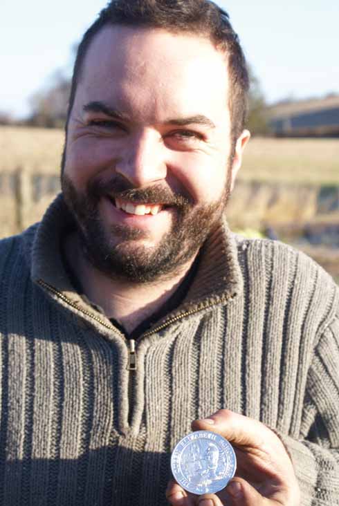 311edLives1 Adam Greenwell with his solid silver Queen Elizabeth Trust medal