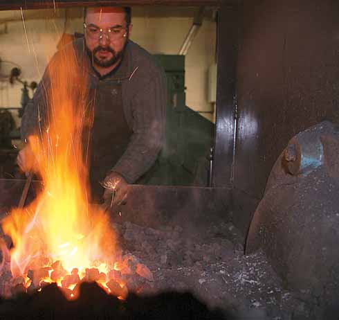 311edLives2A Before any of the five techniques of forging – drawing, shrinking, bending, upsetting, and punching – can be carried out, the metal needs to be heated to the correct temperature; this is determined by eye and experience