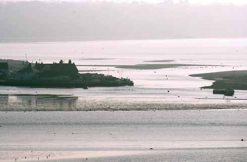 The Stour and Avon combine between Wick and Stanpit in Christchurch Harbour, before passing through the narrow strait between Little Haven and Mudeford spit and out to Christchurch Bay