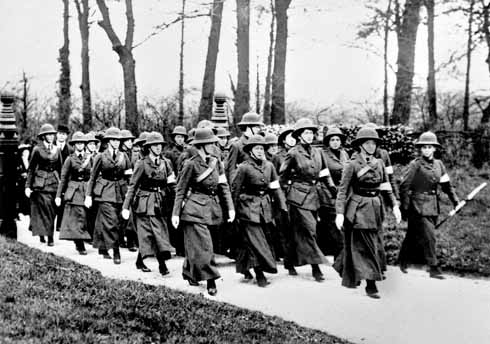 Members of the Women’s Sick and Wounded Convoy Corps on the march, Mabel at their head (author’s collection)