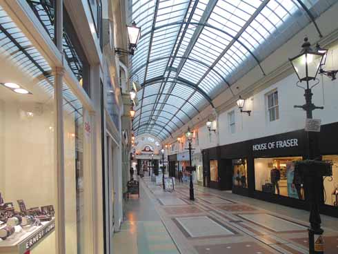The inside of the light and airy arcade was and is an excellent place to shop when the streets outside are teeming with rain
