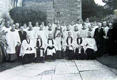 Eric (centre, fourth from right) with the clergy, choir and lay readers at St Mary’s in 1939. Photograph by Joan Muspratt.