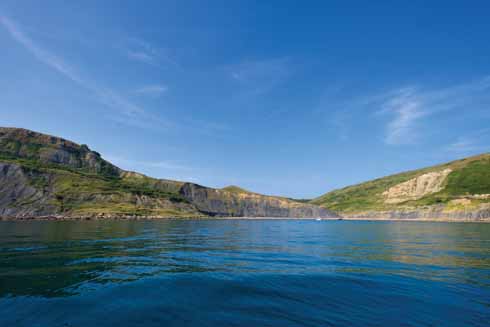 Chapman's Pool is a popular spot for small boats to lay up overnight. This picture, despite the seemingly tropical sky, was taken in January.