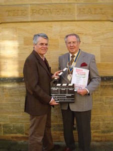 SHIFF Director Roger Johnson and the Rotary Club of Sherborne Castles President, Michael Peart, outside the Powell Theatre at the inaugural event in 2009
