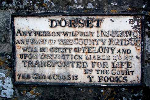 Many a Dorset bridge bears a similar sign threatening transportation to Australia as a punishment for wilfully injuring the bridge