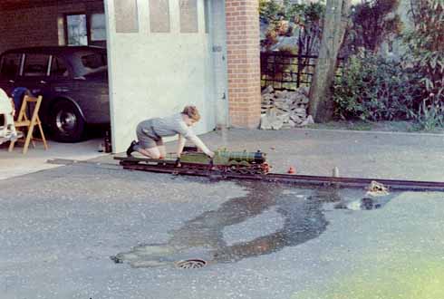 Richard, aged 12, driving his newly acquired 3 1/2-inch gauge Maisie at his home in Elms Avenue, Lilliput