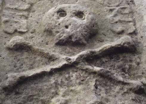he culturally accepted international symbol for pirates – the skull and crossbones – is also found on local headstones
