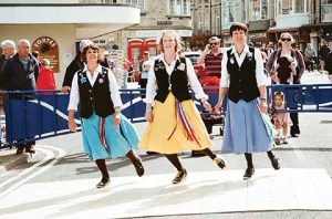 Appalachian clog dancing (no bells, usually with steels on toes and heels) on boards outside the Mowlem